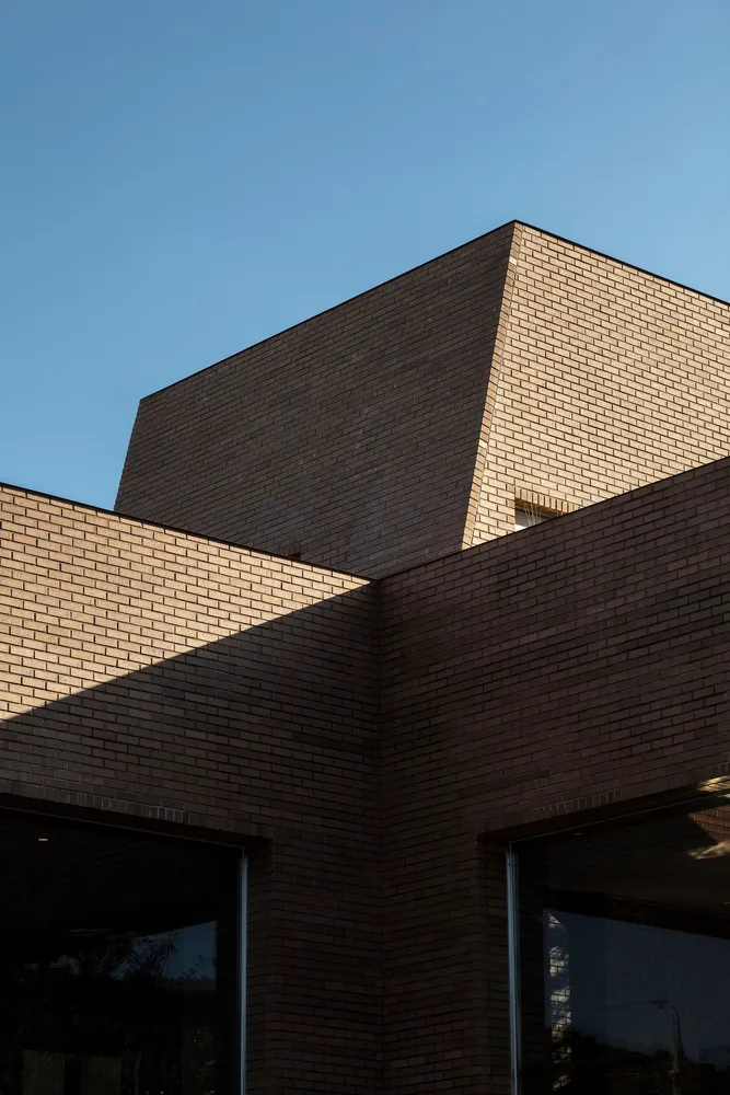 Modern building exterior made of brick.