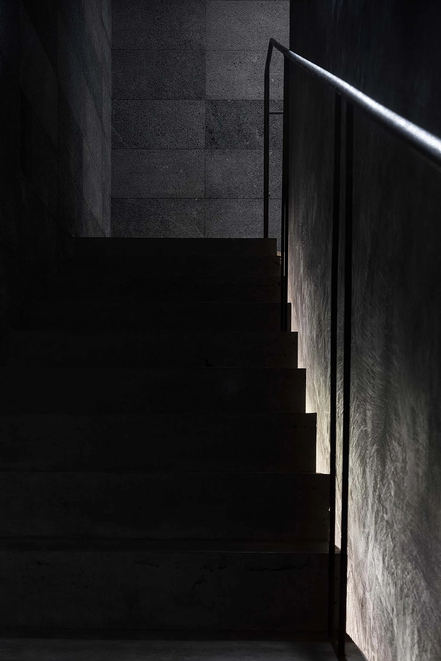 Concrete staircase with minimalistic design elements.