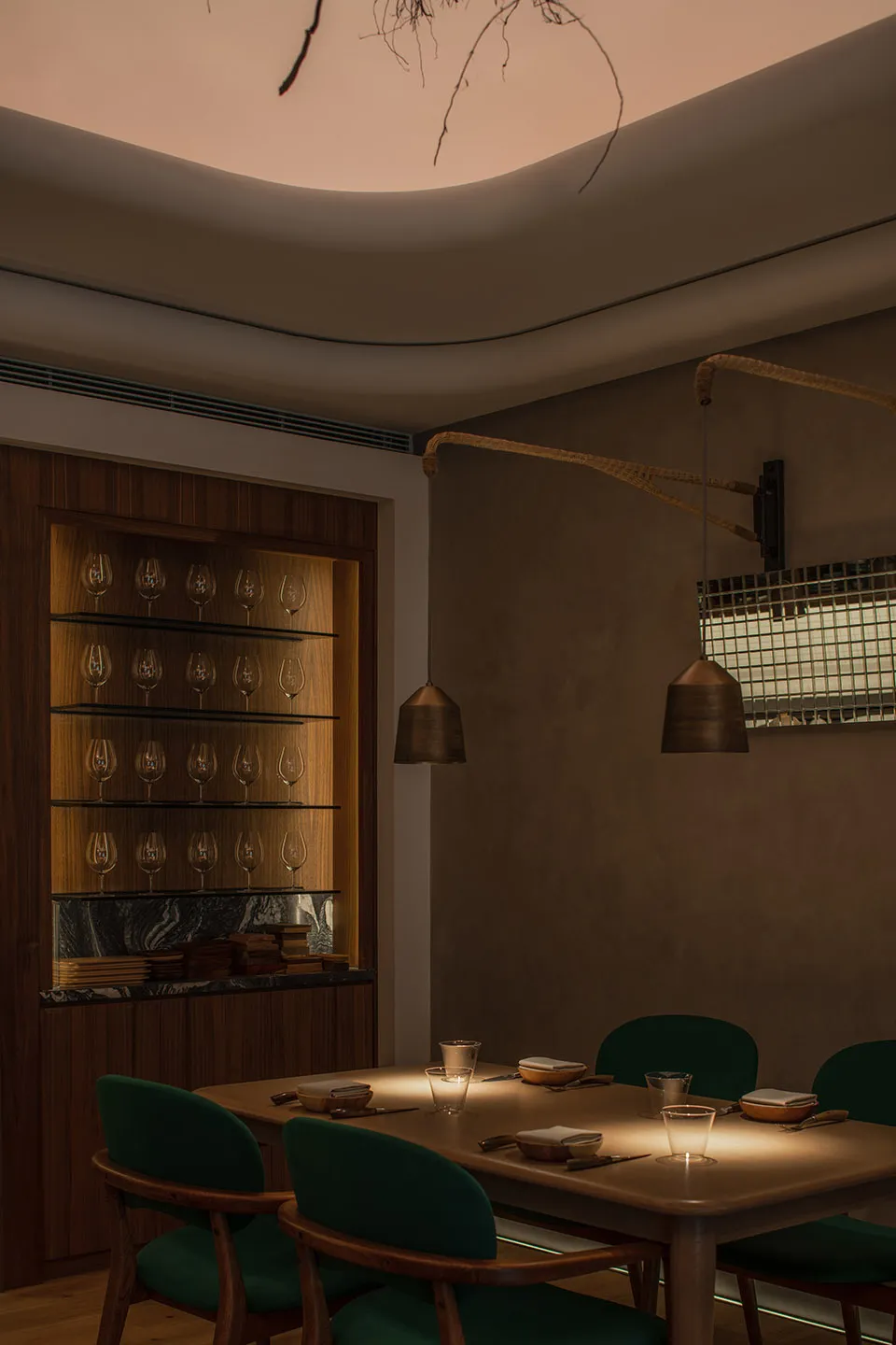 A modern restaurant interior with wooden furniture, minimalistic design, and a warm, inviting atmosphere.