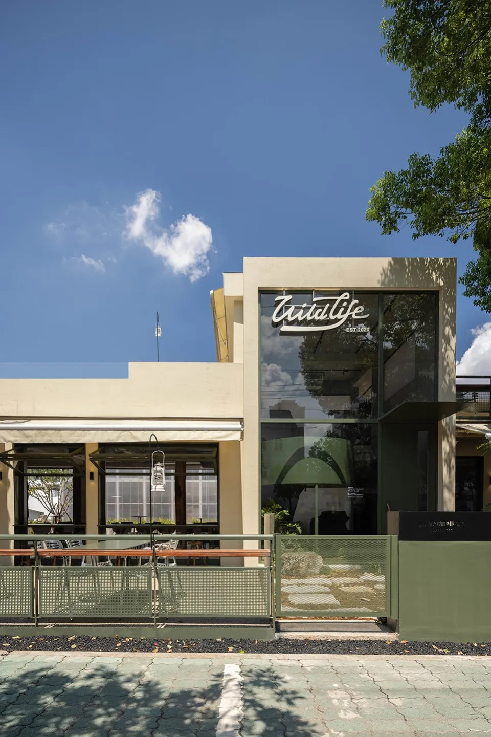 A modern restaurant exterior with a glass window