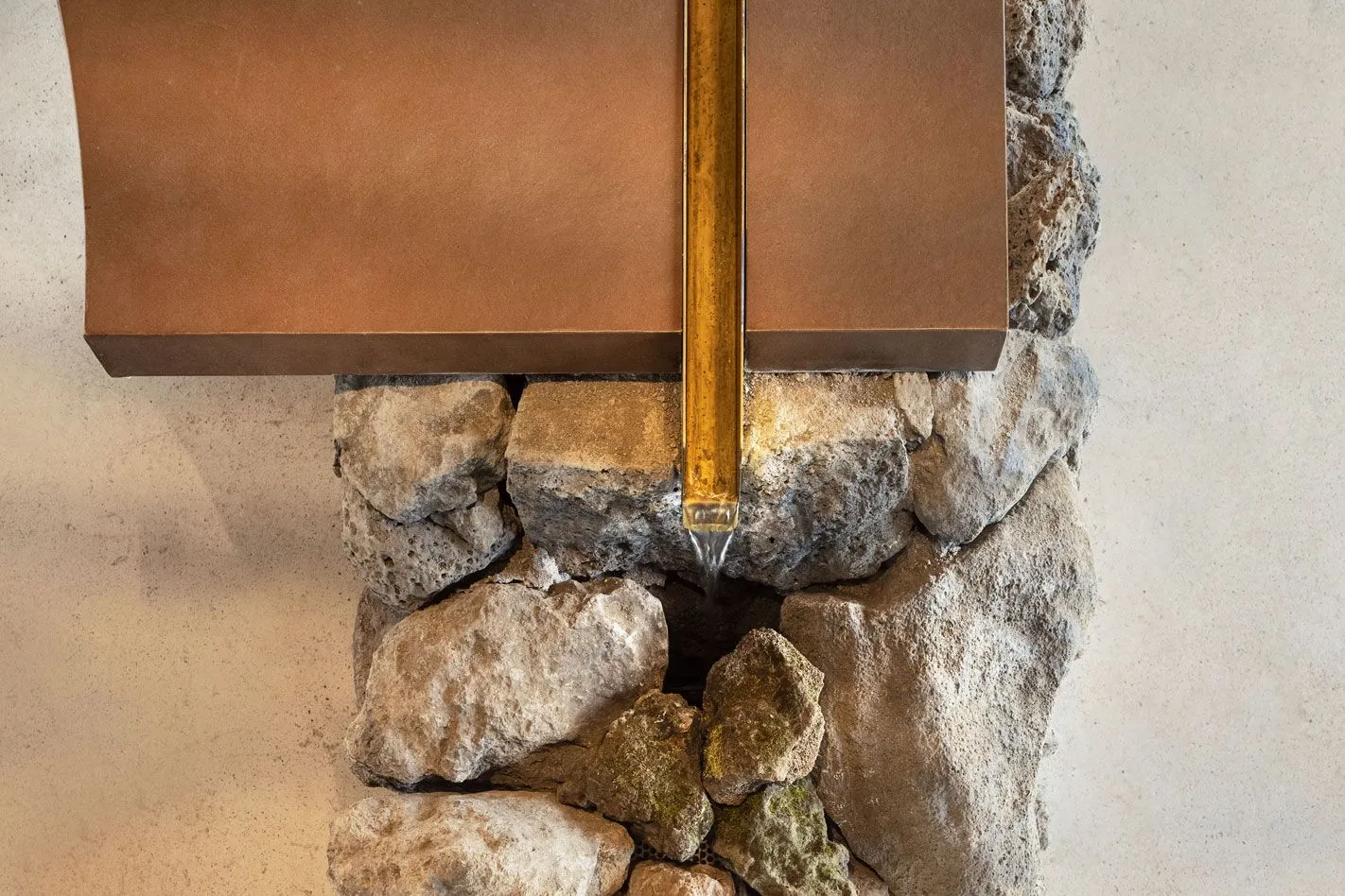 Metal and concrete wall structure with a minimalist design.