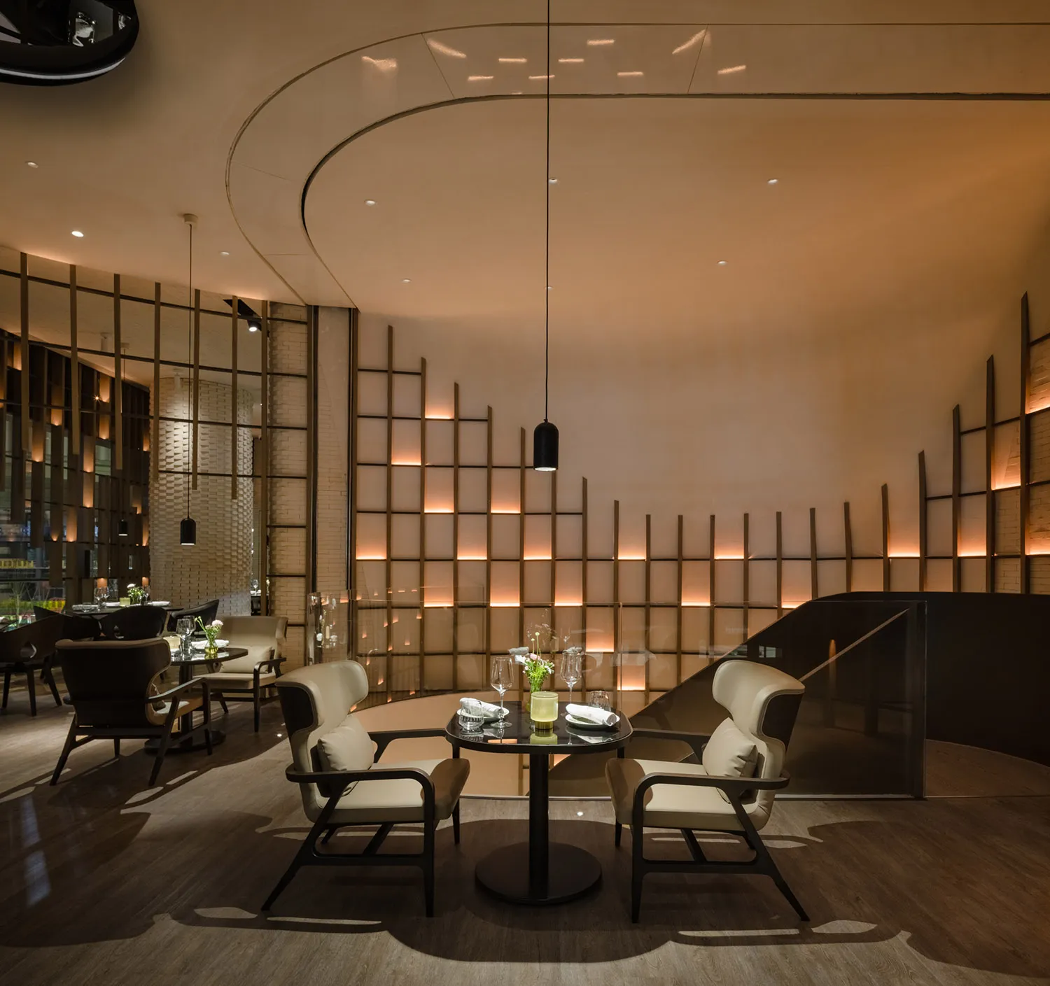 Modern restaurant interior with wooden and glass materials