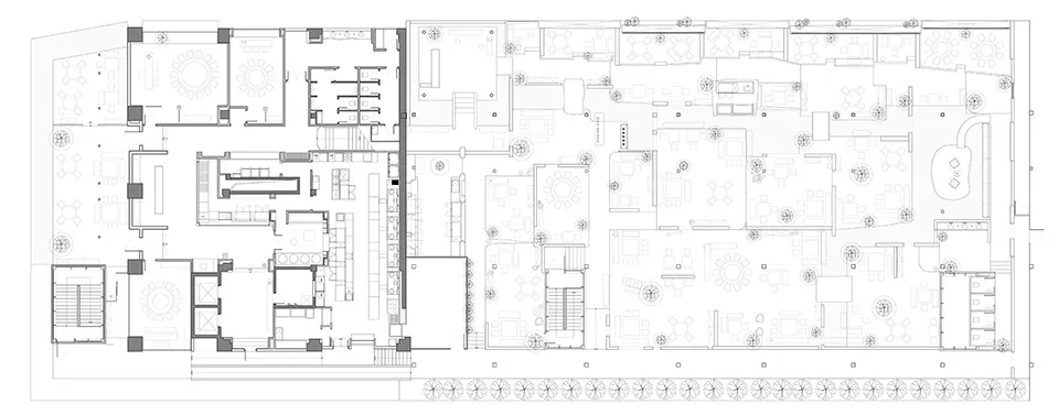 Floor plan of a modern office space featuring various rooms and areas including conference rooms, workstations, and an open p