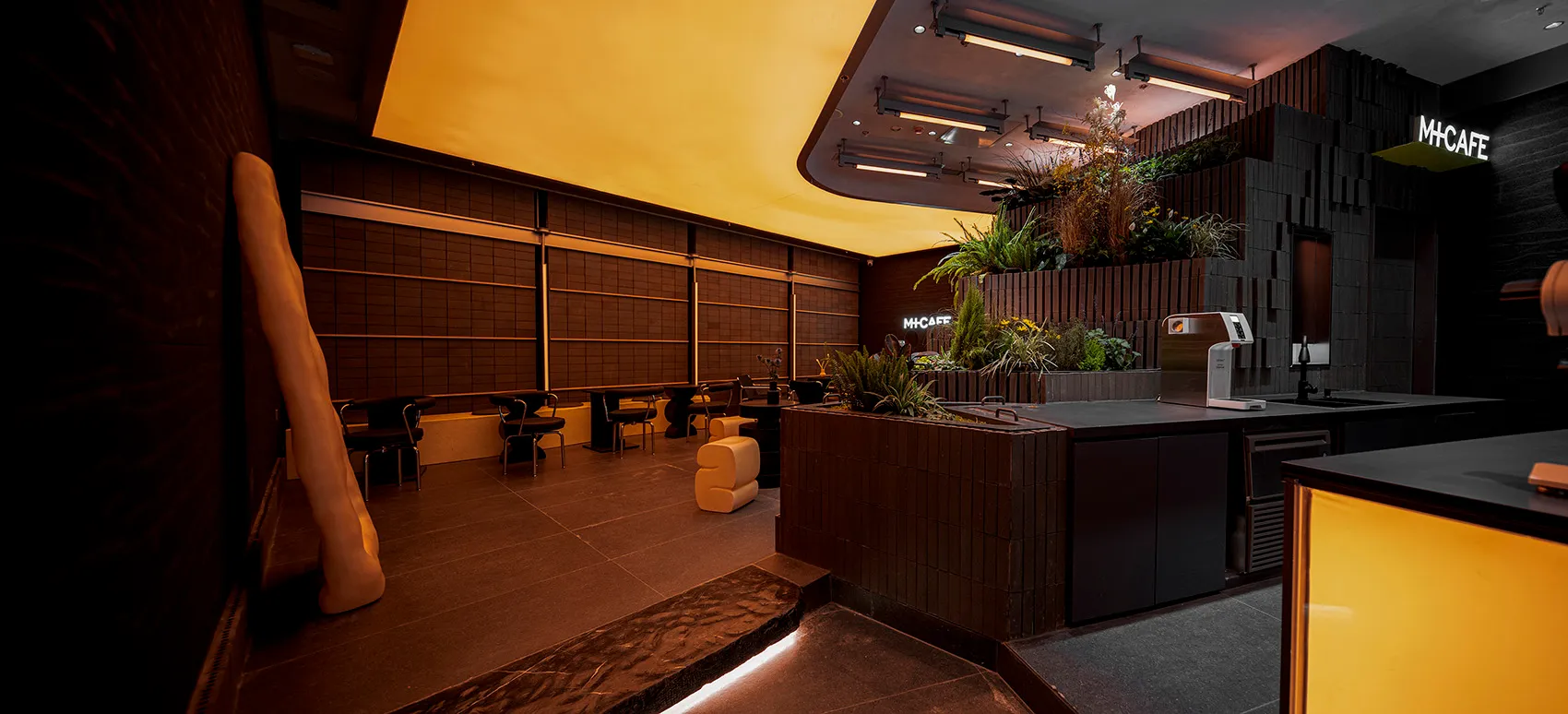 Modern cafe interior with brick, wood, and concrete materials