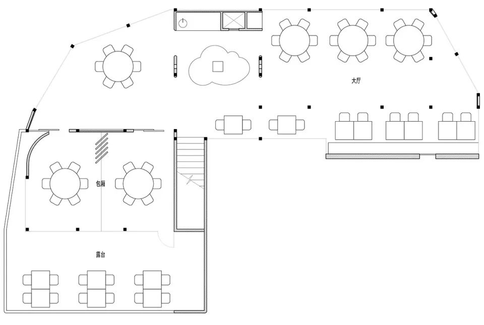 A black and white architectural drawing of a restaurant floor plan.