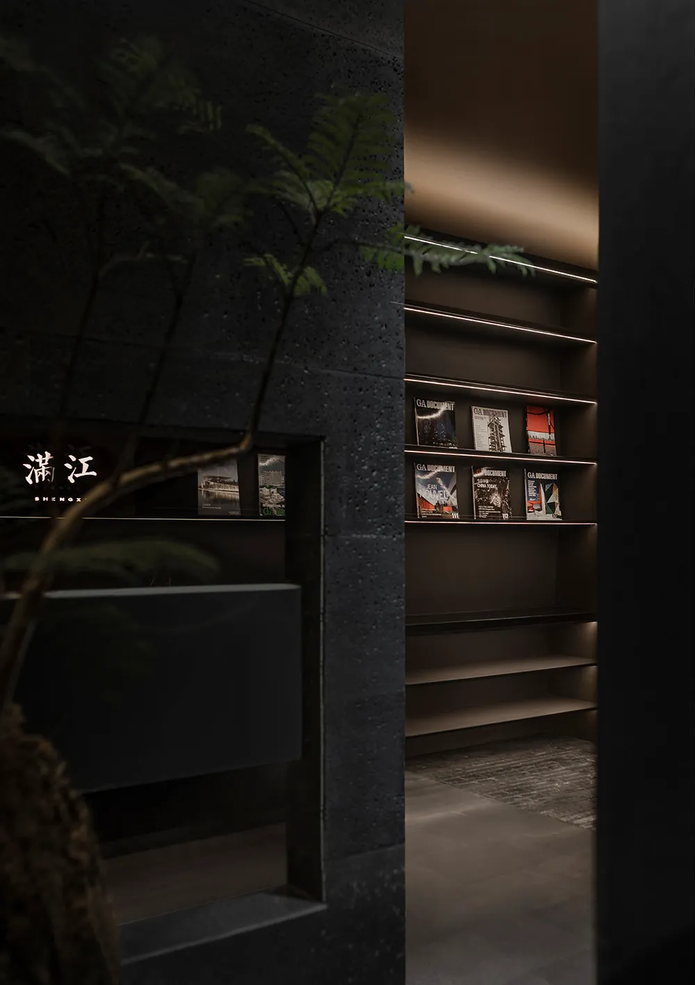 A modern bookshelf with concrete shelving and a sleek, minimalist design.