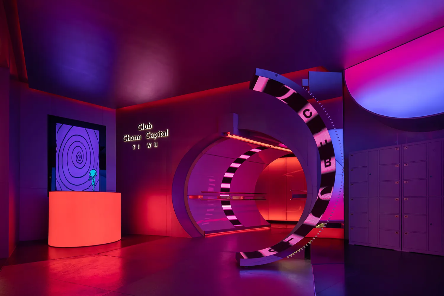 Modern nightclub interior with metal and glass structures and neon lights.