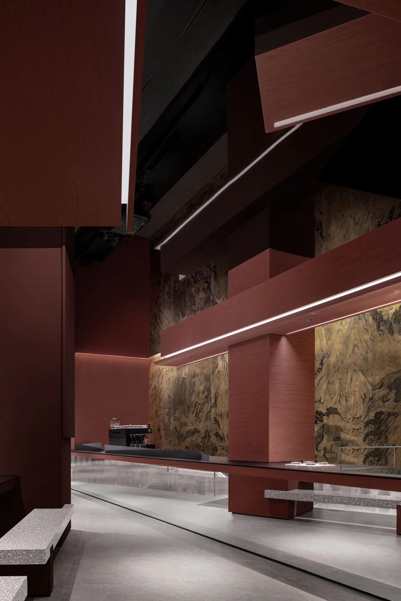 A modern coffee shop interior featuring marble and wood elements.