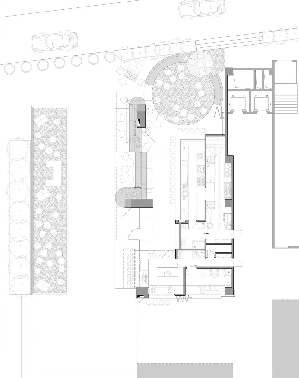 Floor plan of a modern restaurant featuring metal and glass elements.