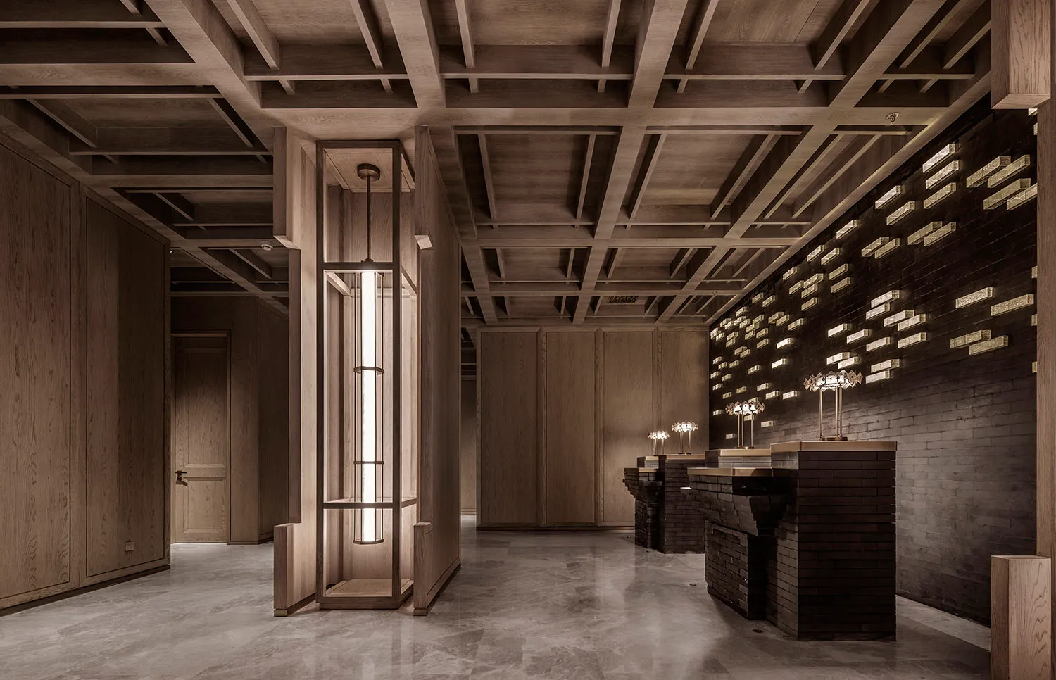 A modern industrial lobby featuring brick and concrete materials.