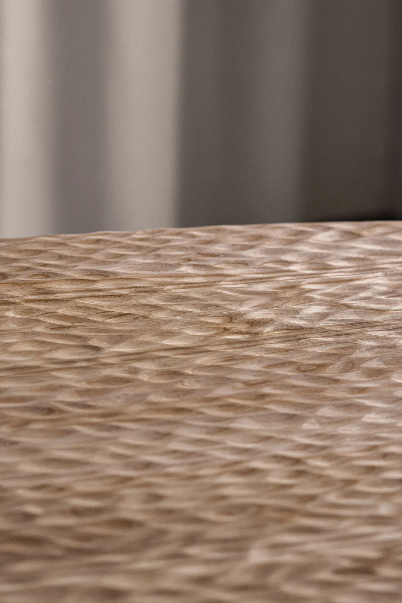 A close-up of a modern laminate texture wood surface