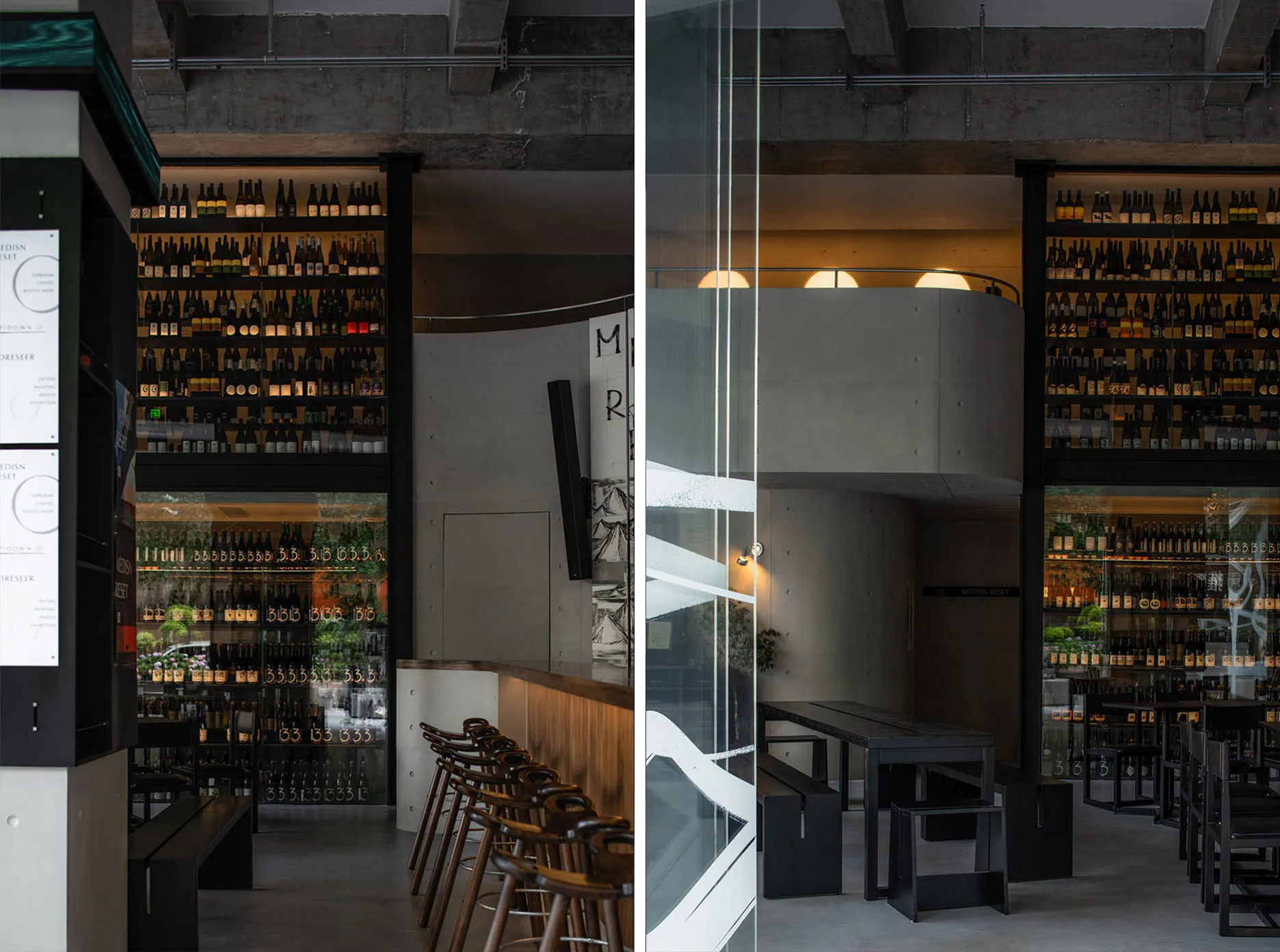 Concrete and glass bar interior with industrial-style decor and lighting.
