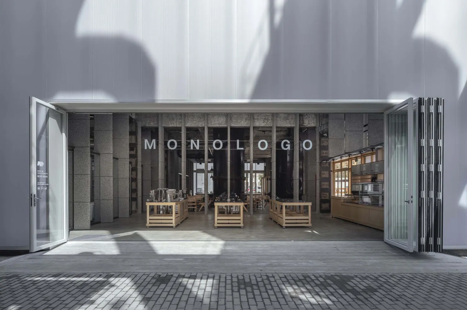 Modern coffee shop with concrete and stone interior design