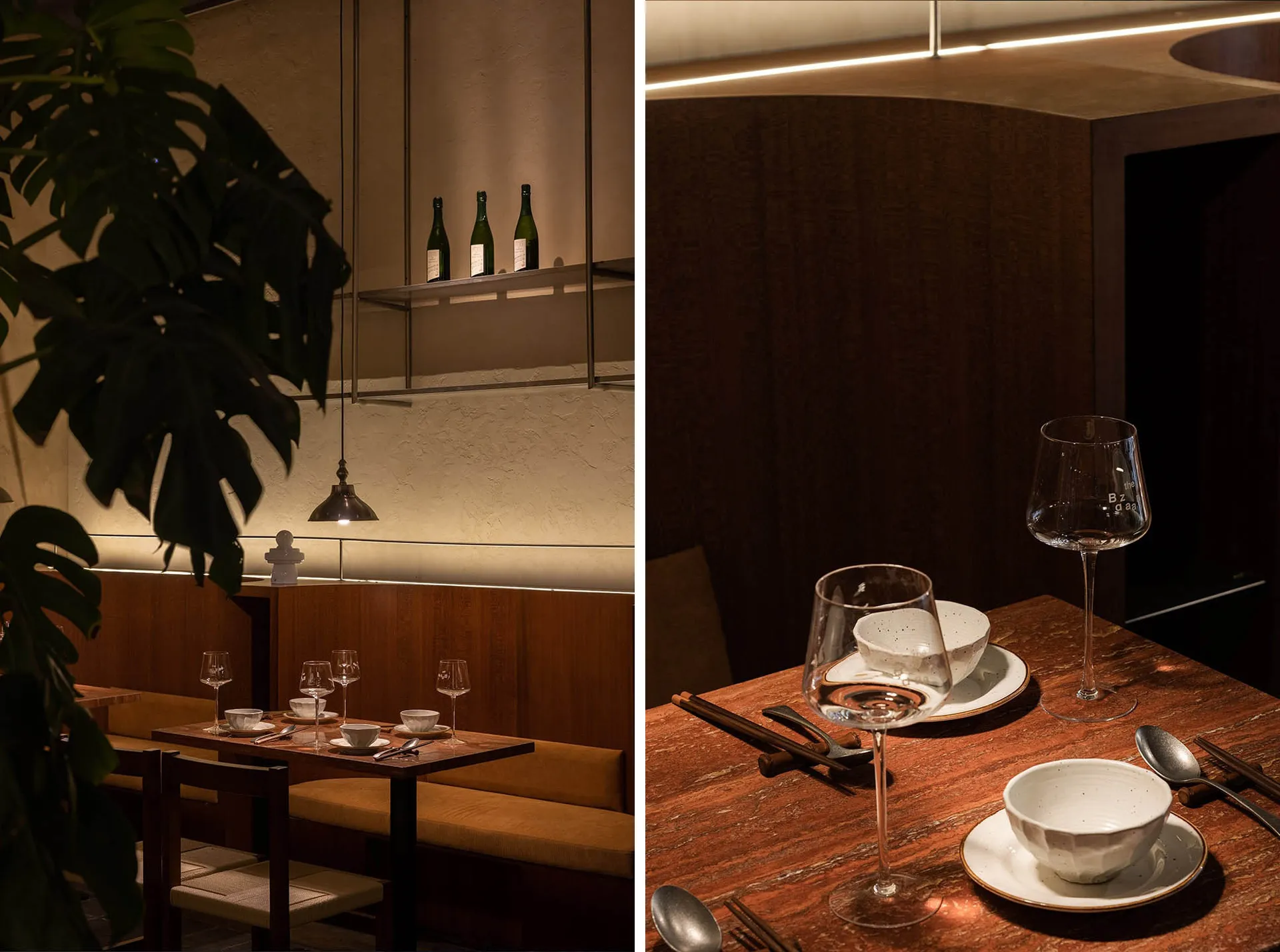 A modern restaurant interior with wooden benches and cement walls.