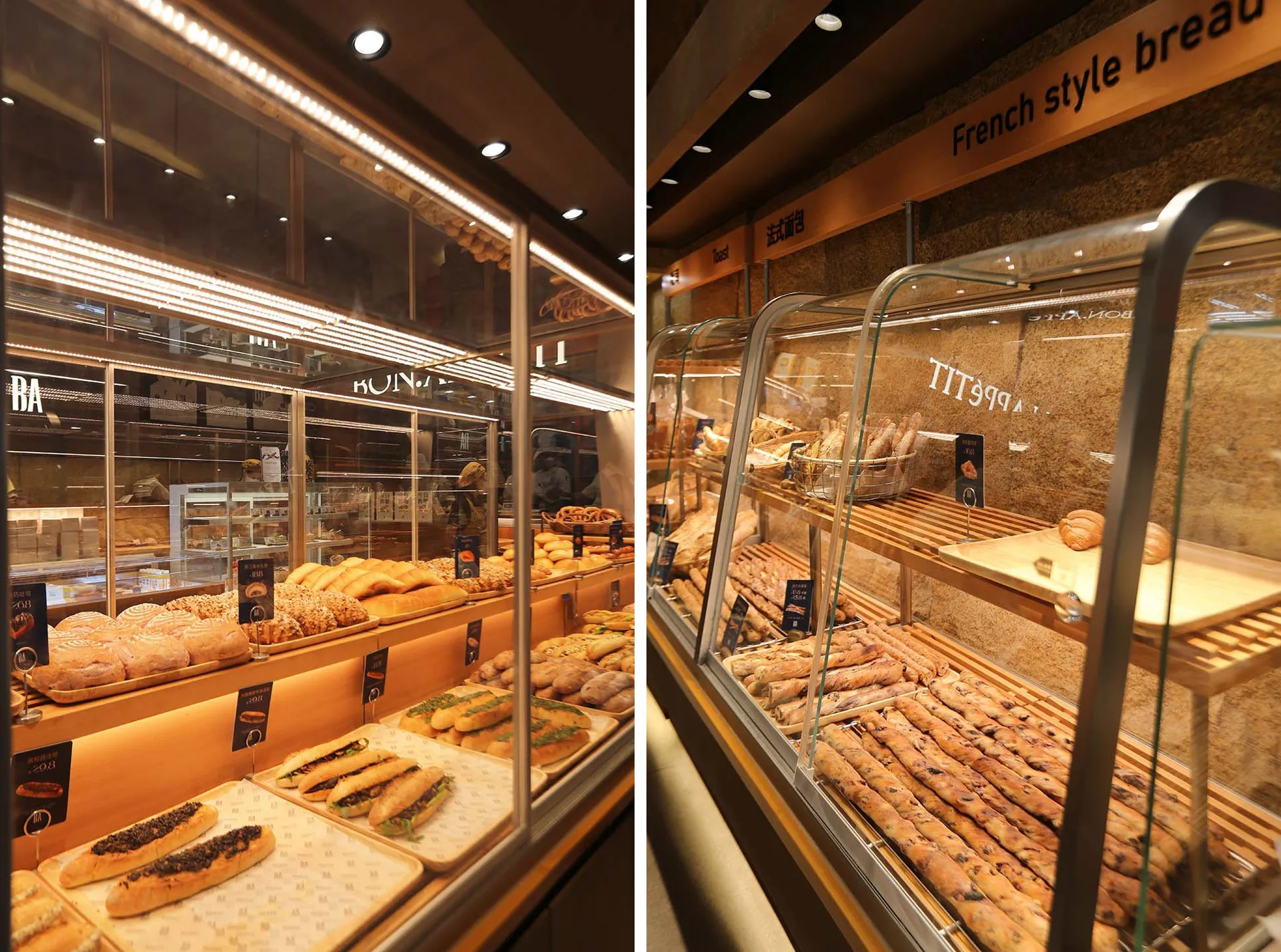 一家現代麵包店在玻璃展示櫃中陳列各式新鮮出爐麵包與甜點。