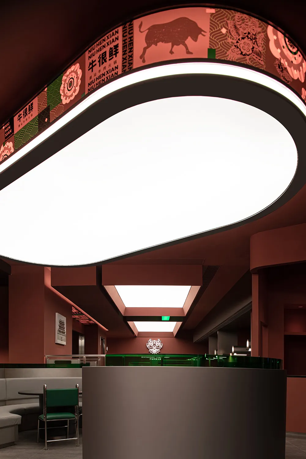 A modern restaurant interior with metal and concrete materials and minimalist design.
