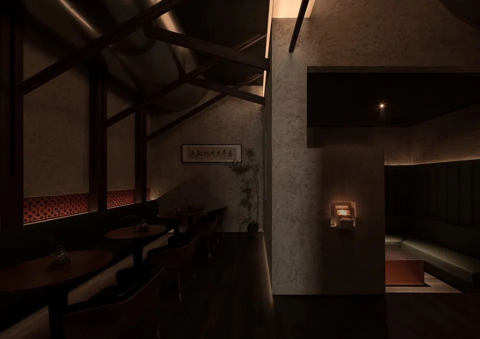 A modern restaurant hall with concrete walls and floor, featuring minimalist seating arrangements and ambient lighting.