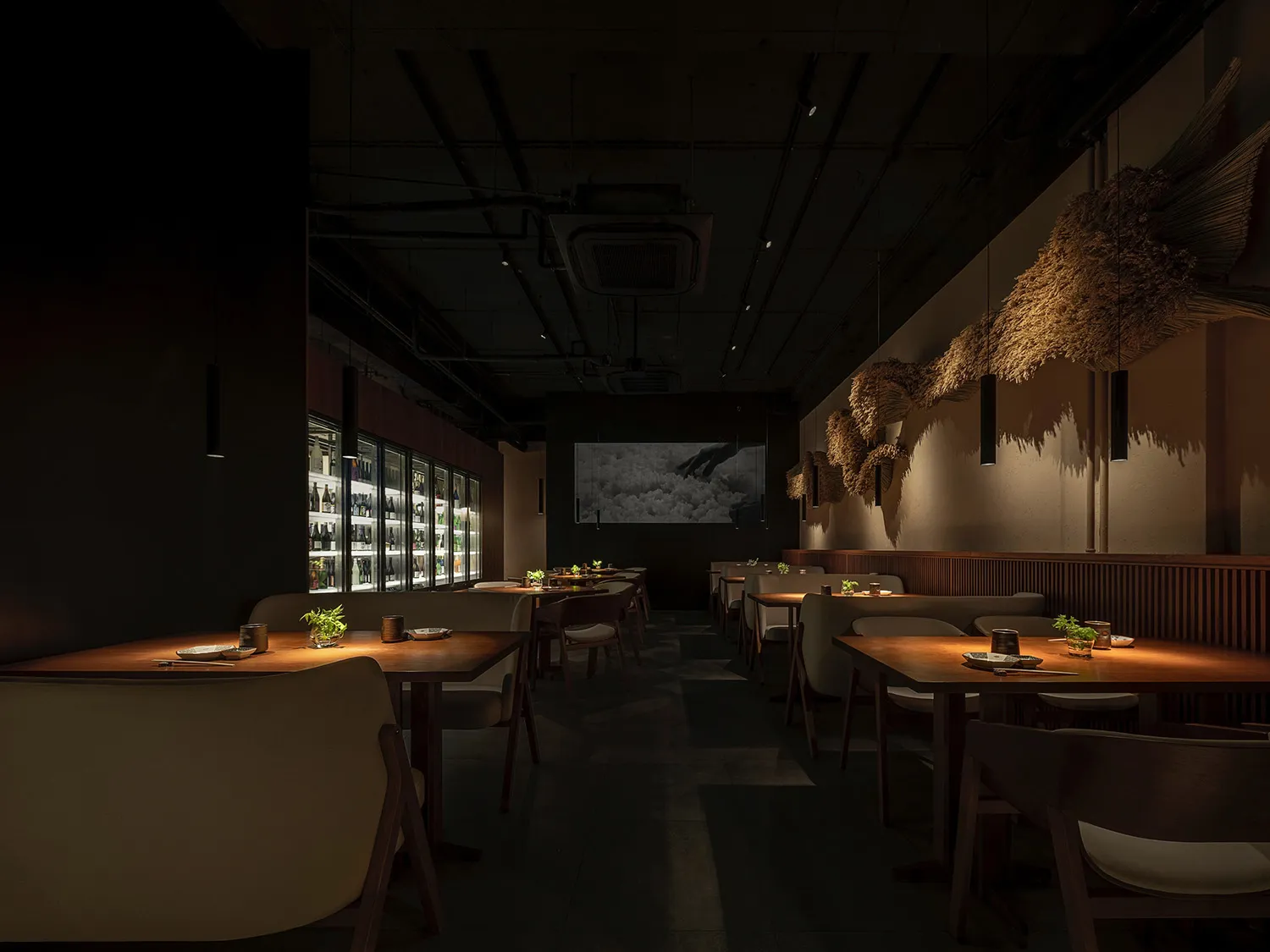 Modern restaurant interior with wood furniture, concrete walls, and contemporary design elements.