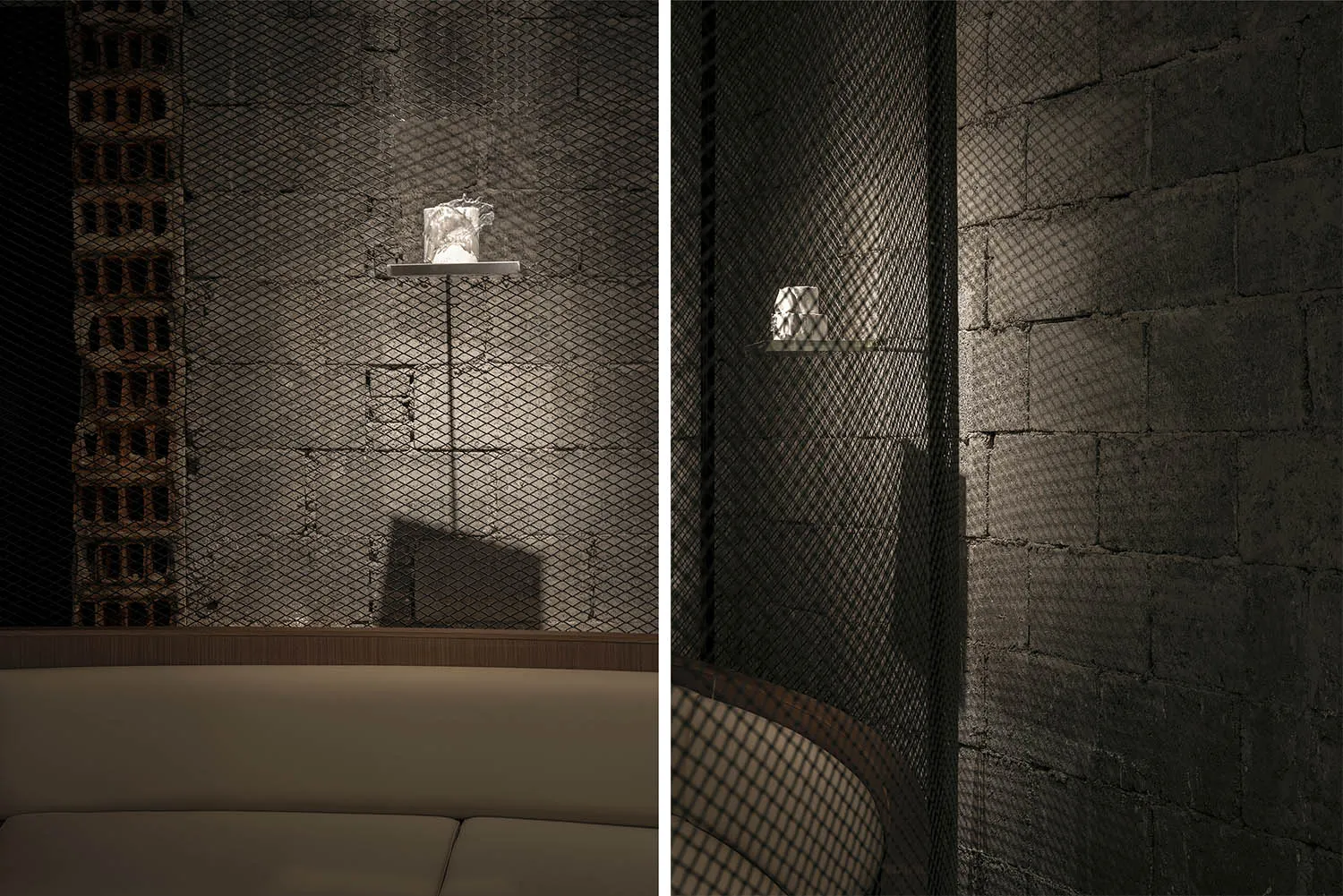 A modern restaurant interior with metal grid walls and concrete elements.