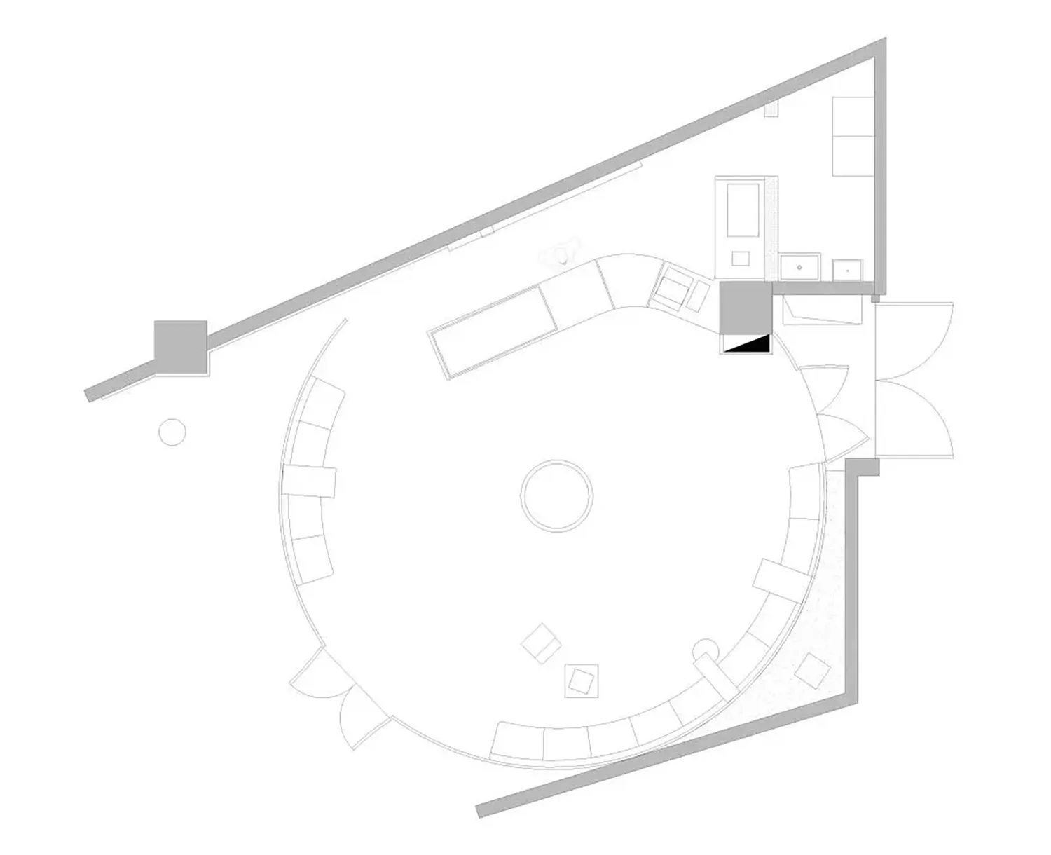 A minimalist interior design featuring a circular layout with sleek, modern furnishings and geometric shapes.