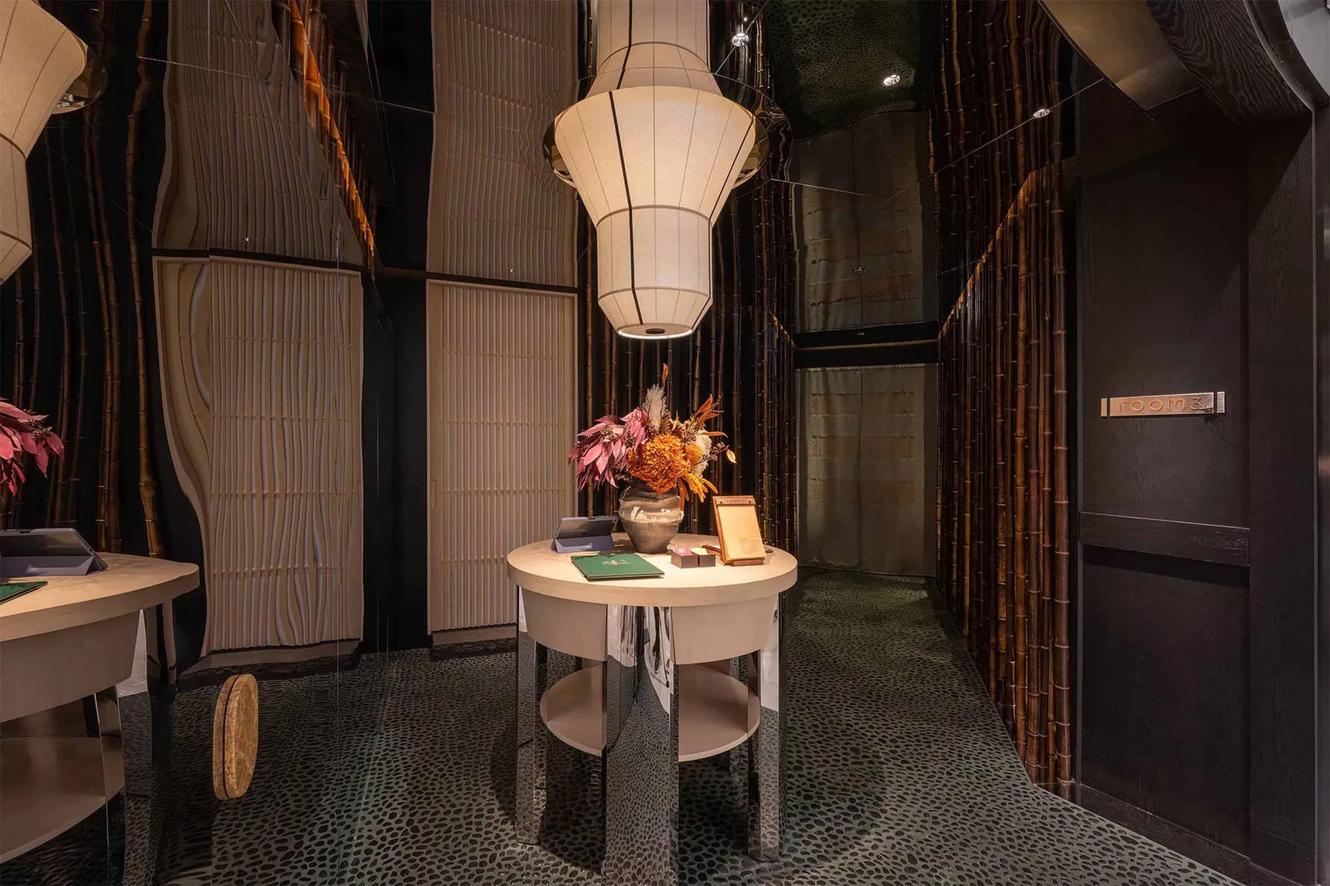 Modern interior design featuring bamboo elements in a hotel suite