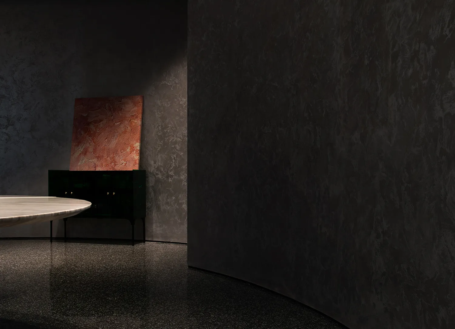 A minimalist interior design featuring a concrete floor and wall.