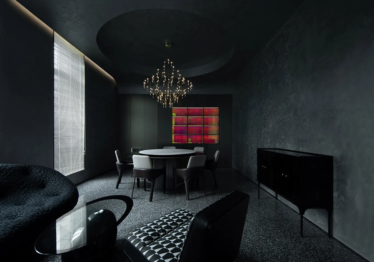 A modern residential dining room with concrete walls, a round table, and a chandelier.
