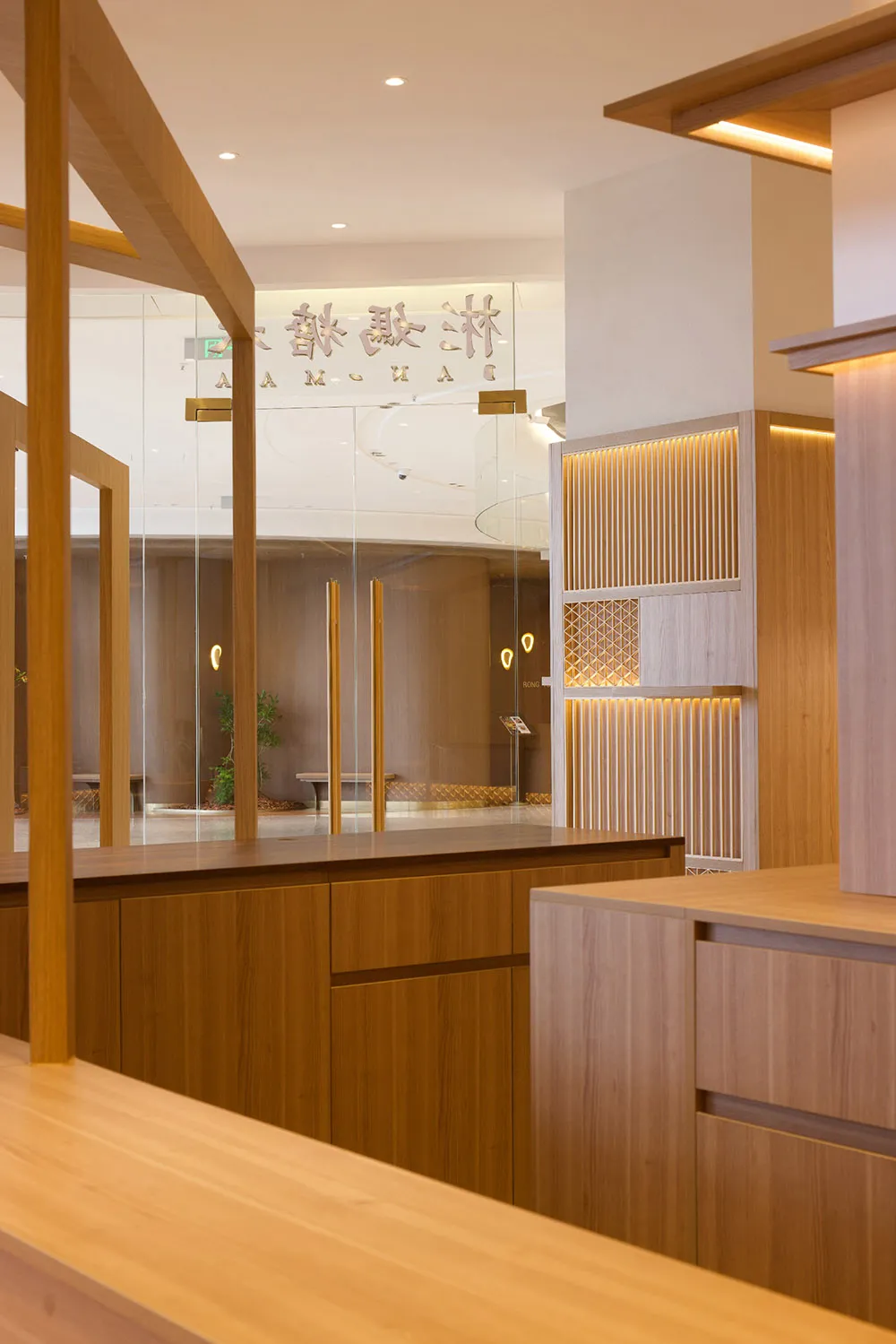 A modern retail storefront featuring wooden and glass materials.