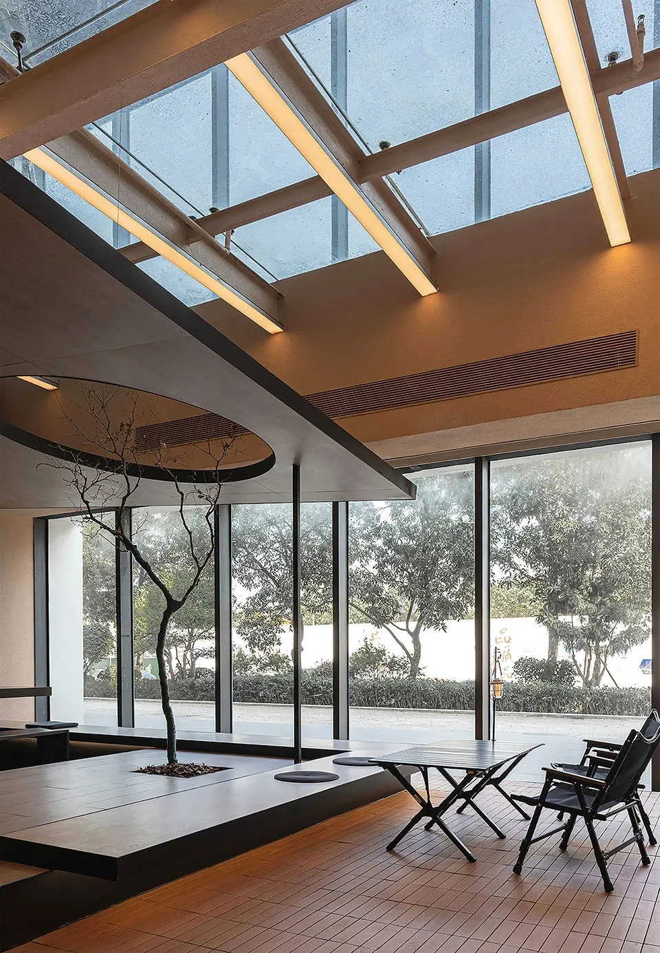 A modern home interior featuring wood and glass materials.