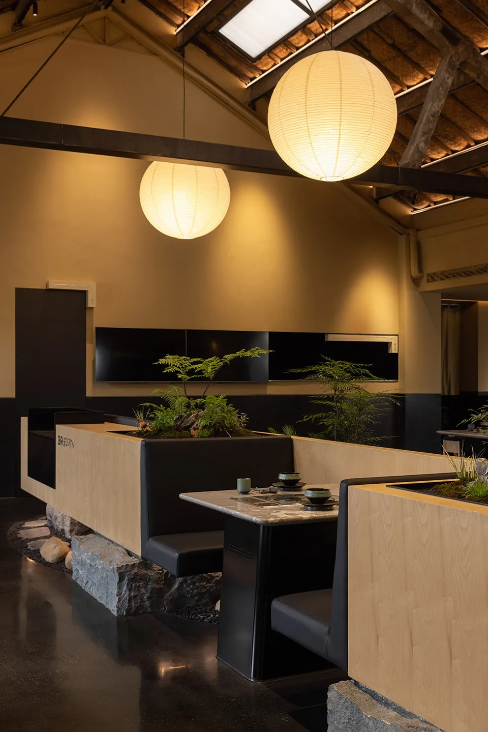 Modern Japanese restaurant interior with minimalist design features.