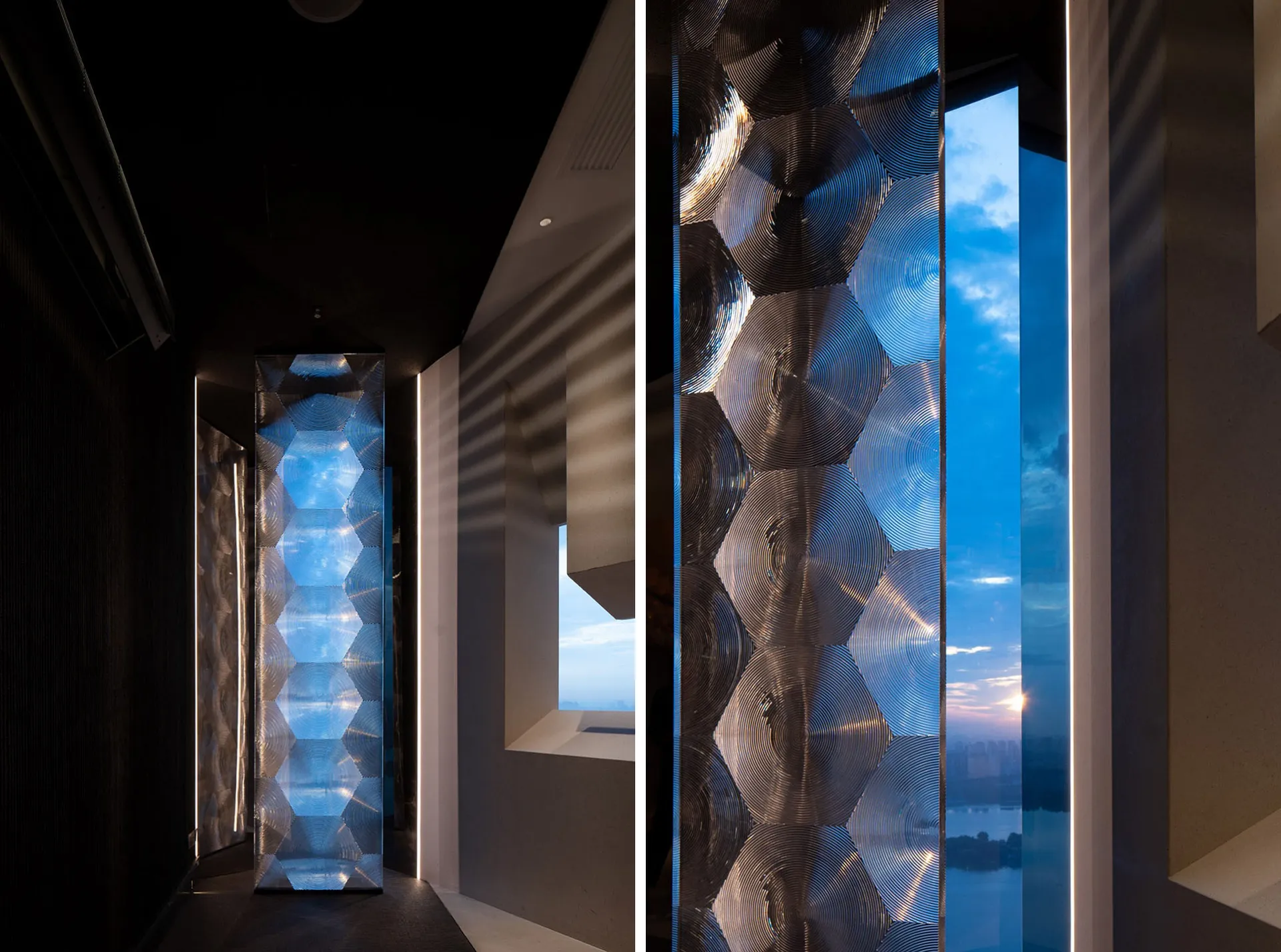 Modern office space featuring glass columns with reflective surfaces