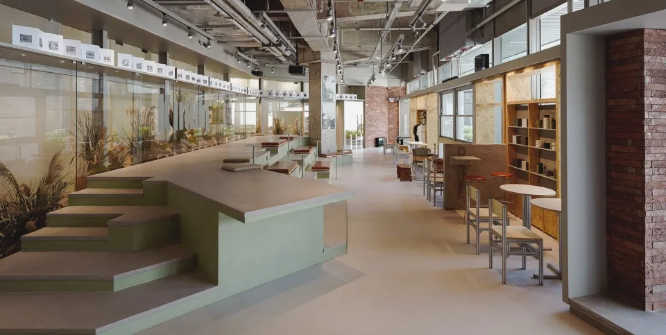 Modern cafe interior with concrete mix materials and minimalist design