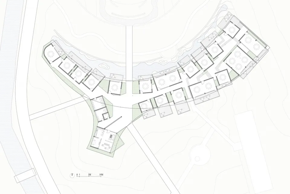 住宅建築的平面圖，置於白色背景的紙張上，帶有格線。