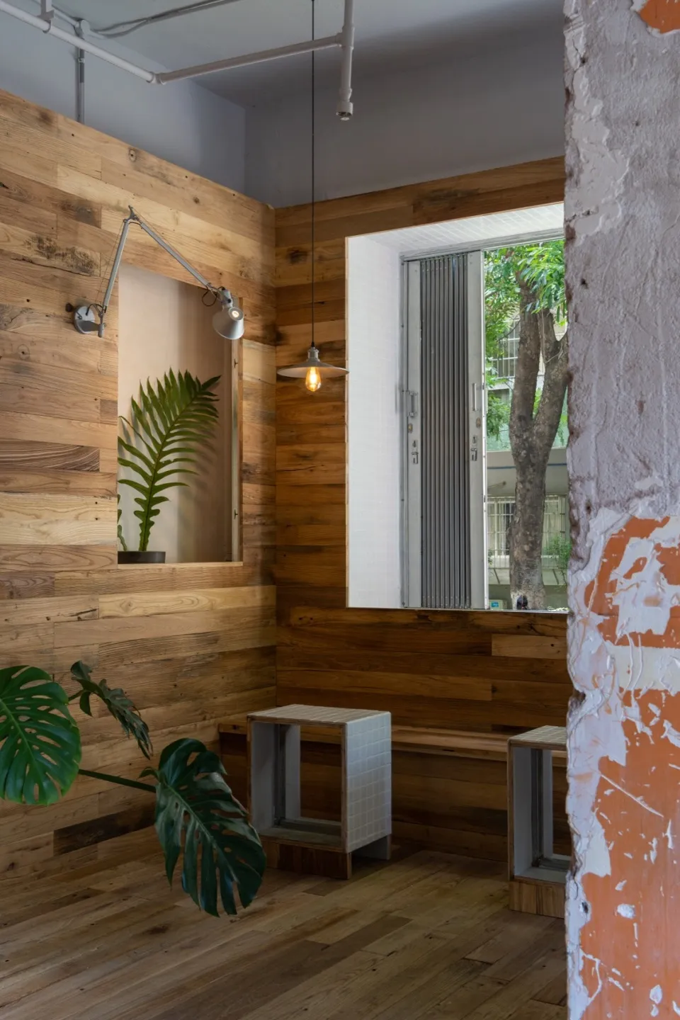 modern coffee shop interior with wooden walls and ceiling