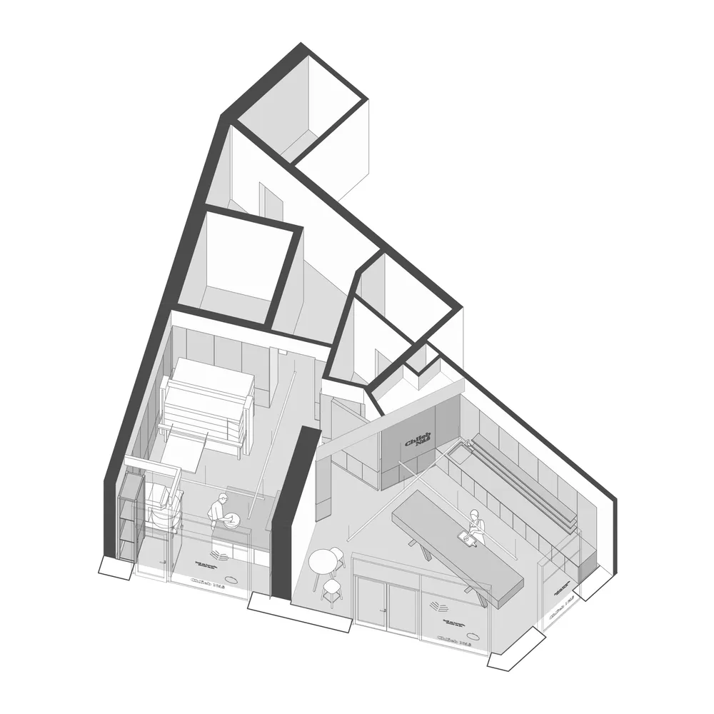 Minimalist office space featuring metallic and glass materials.