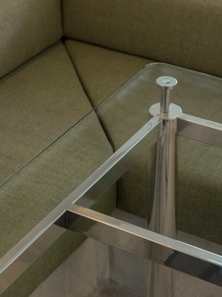 Glass and stainless steel modern interior design, featuring minimalist aesthetics and contemporary furniture.