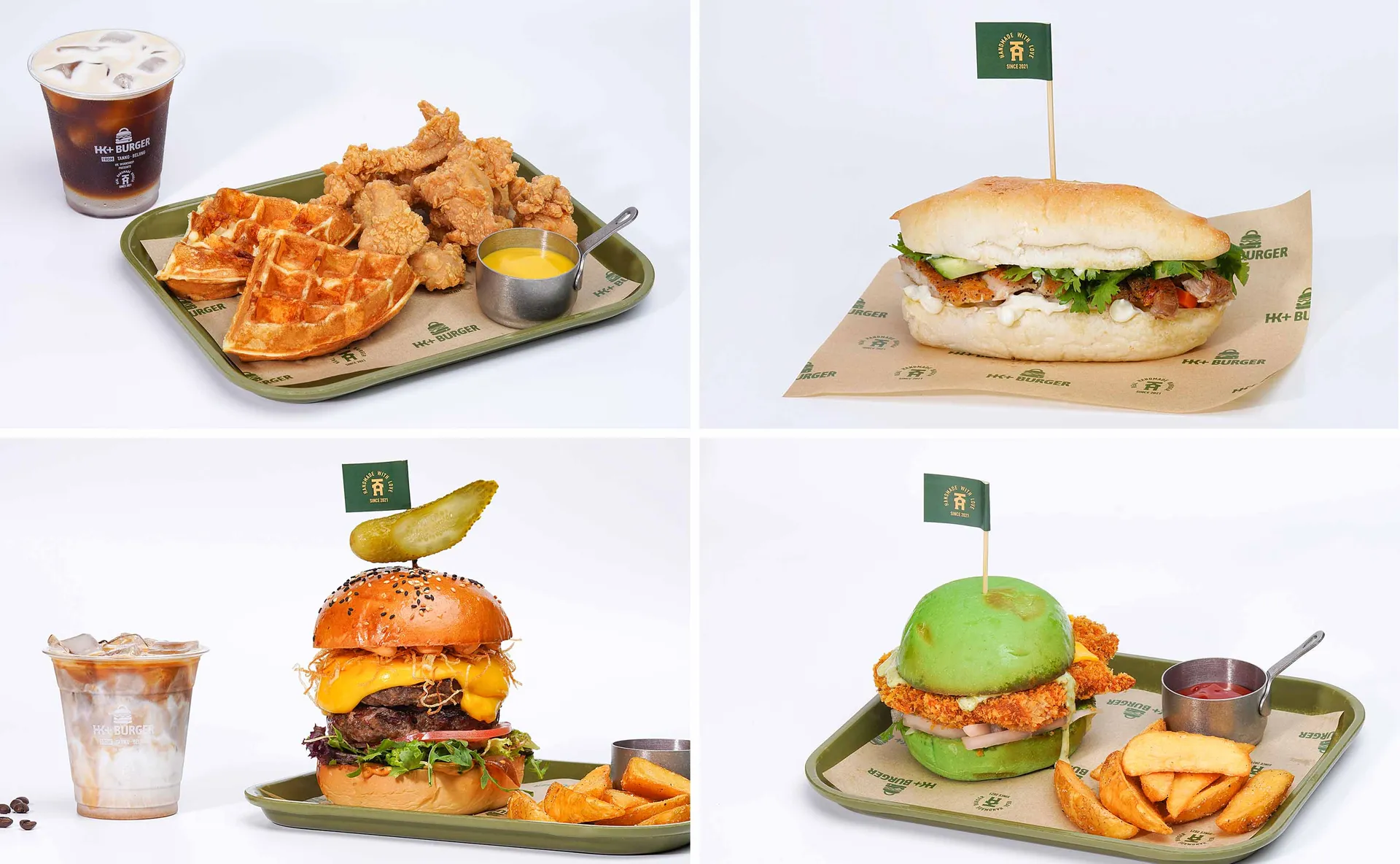 A food tray containing various food items such as fried chicken, waffles, a burger, fries, and an iced coffee drink.