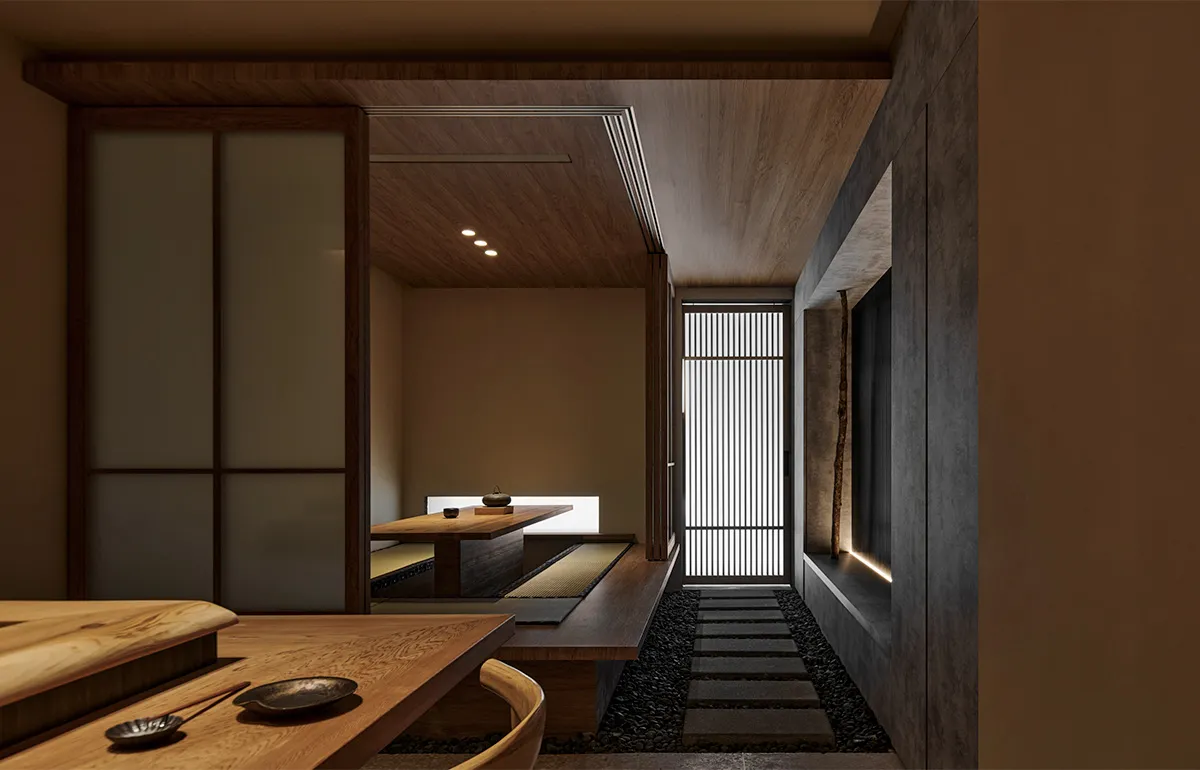 A modern minimalist dining room with wooden flooring and furniture, featuring a wooden table and chairs, and a sliding door.