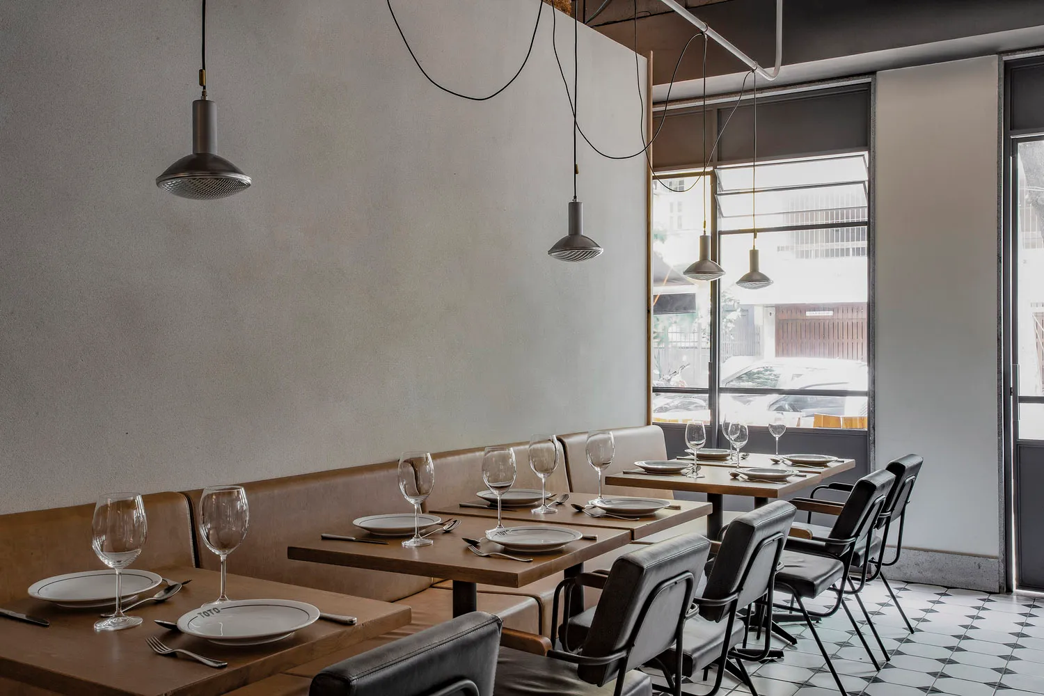 A modern restaurant dining area with sleek, contemporary design elements.