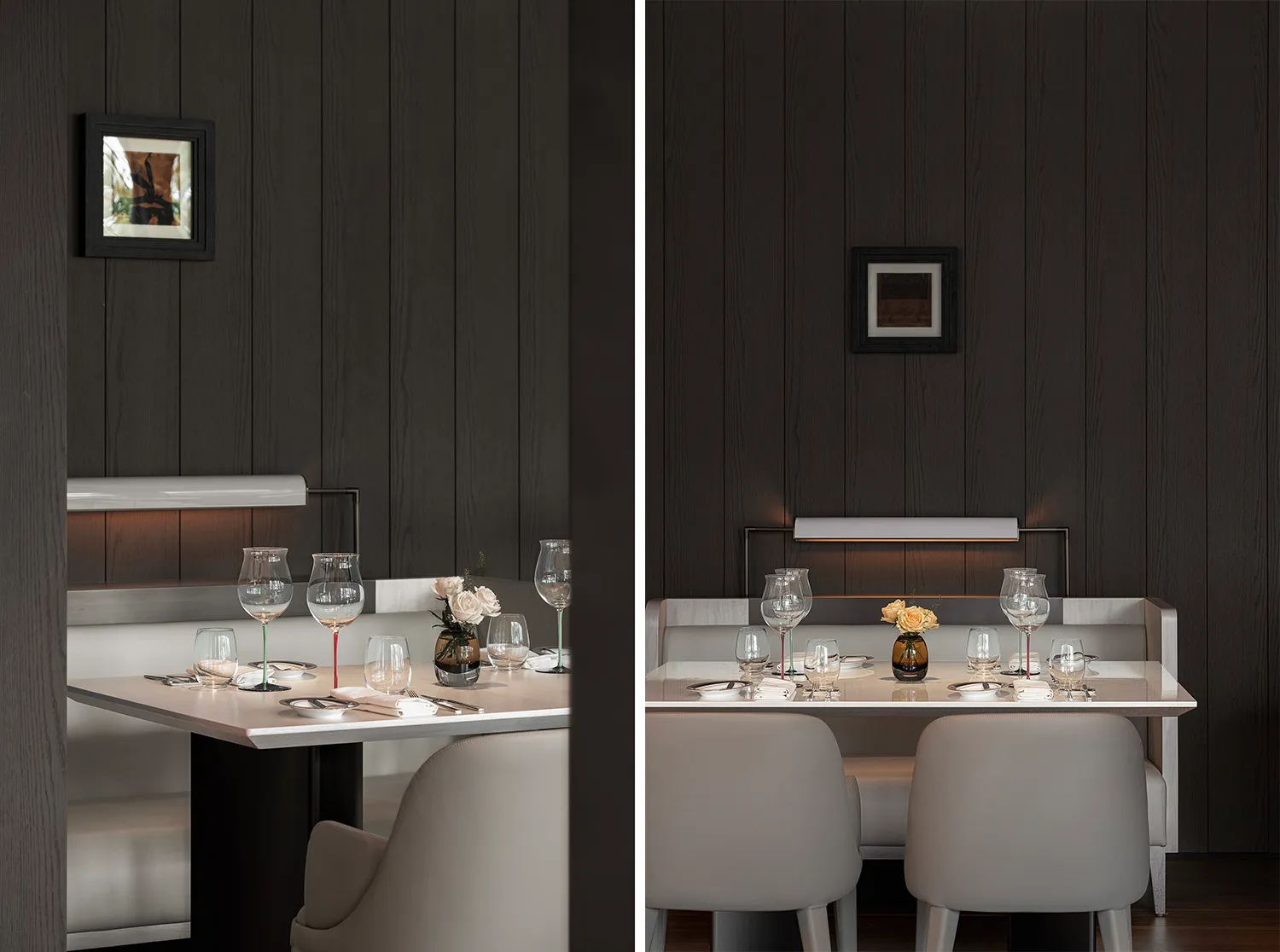 A modern restaurant interior with a white table setting on a wooden surface.