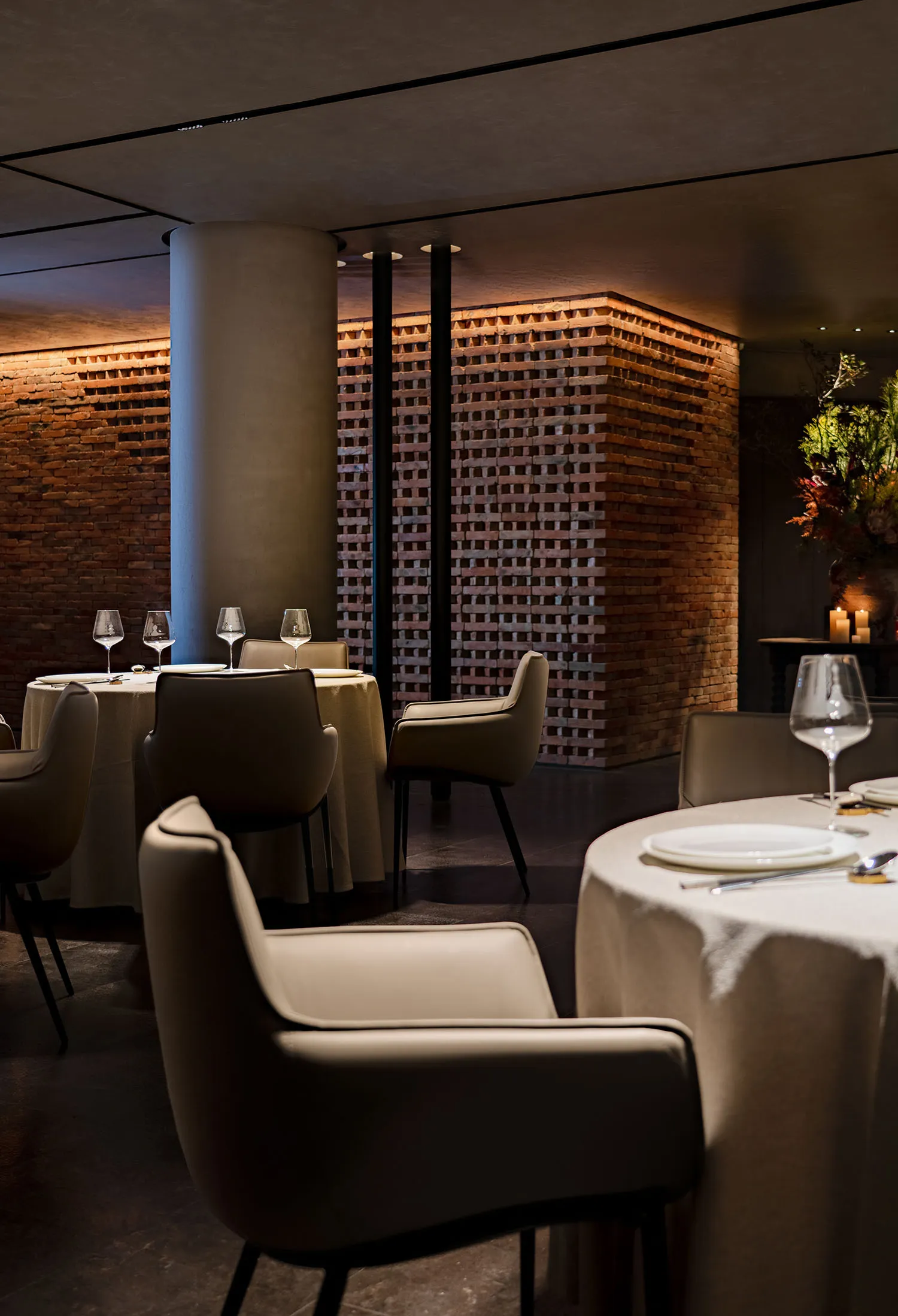 Modern restaurant interior with brick and concrete textures