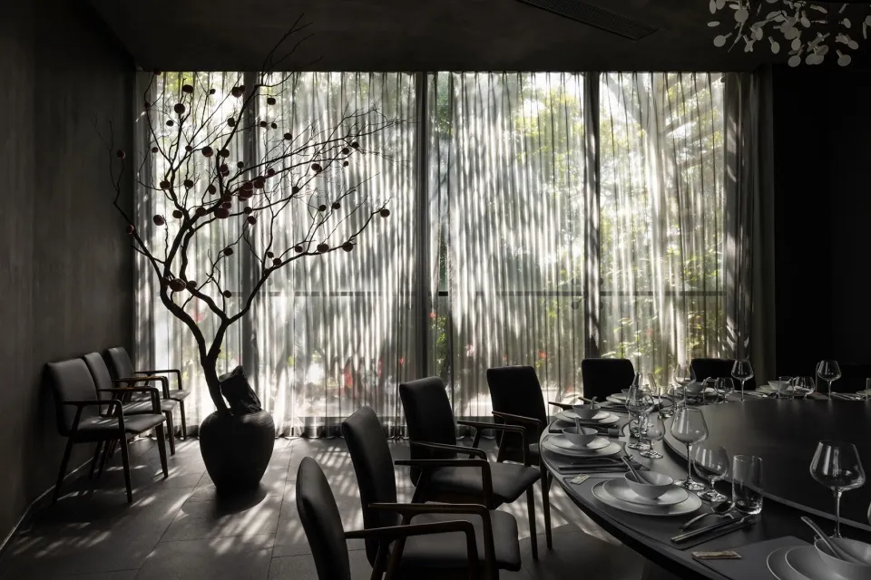 Modern dining room with glass curtains and minimalist design