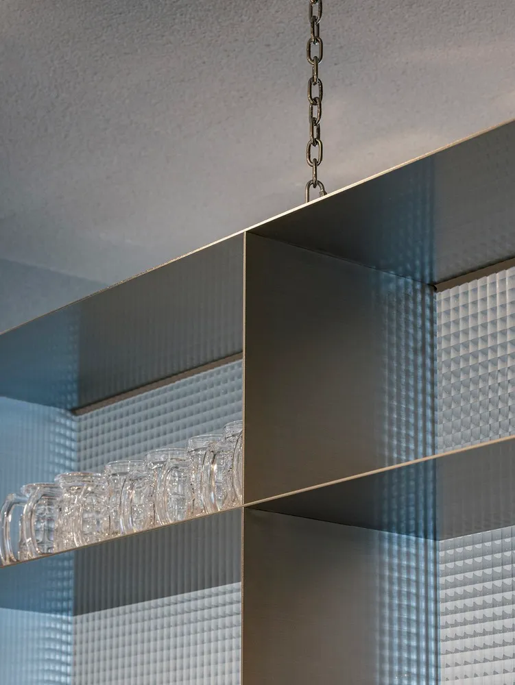 Minimalist interior design featuring steel elements.