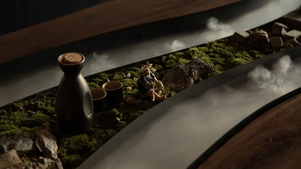 A minimalist interior design featuring wooden furniture, stone accents, and mossy textures