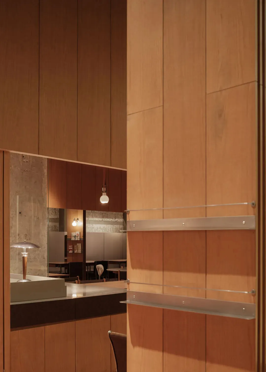 Contemporary office setting featuring exposed wooden paneling.