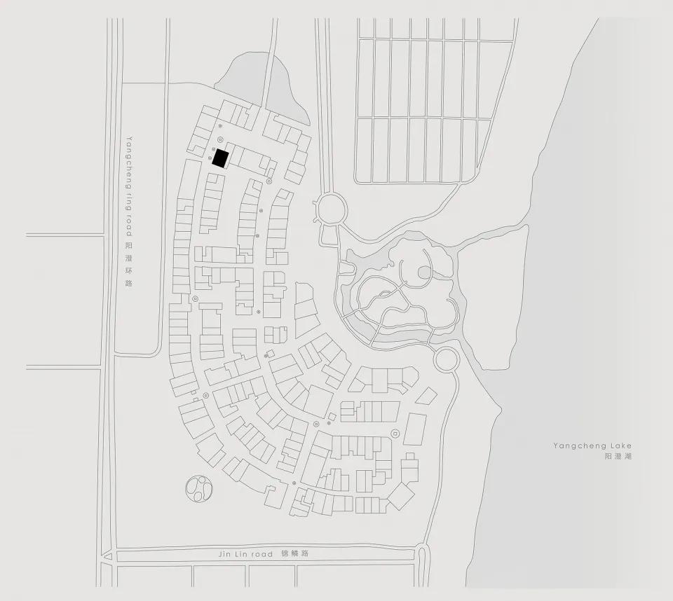 A detailed site plan of a residential development, including roadways and buildings.