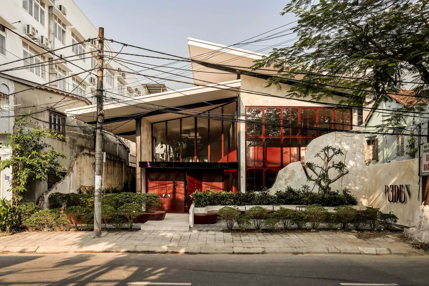Modern building facade with concrete and glass materials.
