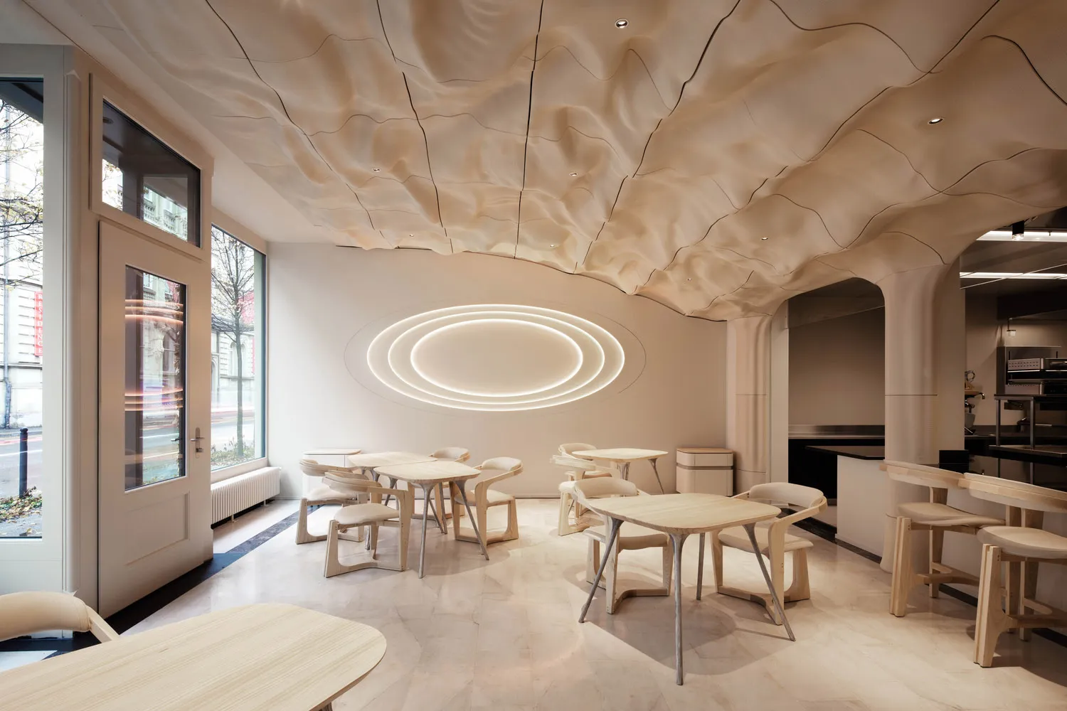 Marbled wood tables and chairs in a modern restaurant interior