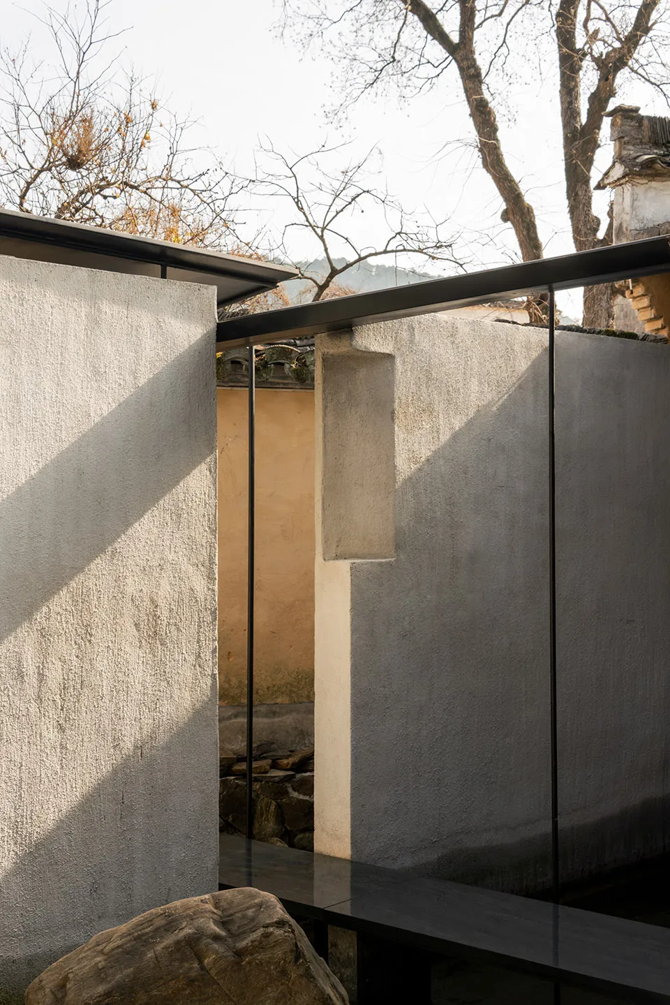A minimalist architectural design featuring concrete materials.