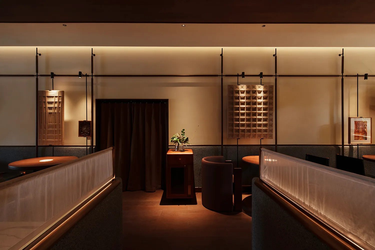 Interior view of a Japanese cuisine restaurant with wooden materials and minimalist decor.